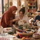 Hand embroidering a palm tree motif on a hoop in a Marrakech workshop